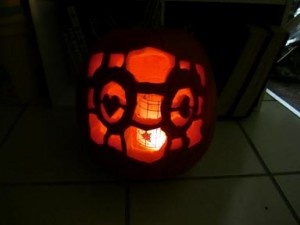 The Companion Cube carved into a pumpkin